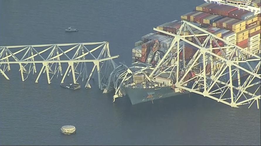 Ship hits bridge in Baltimore causing entire bridge to collapse (Video)